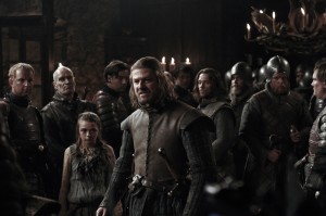 Ned defends Arya at the Inn